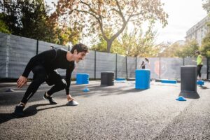 A male exercising outdoors, engaging in aerobic activity, utilizing the body's energy systems. Keywords: energy systems and exercise, aerobic and anaerobic exercise.