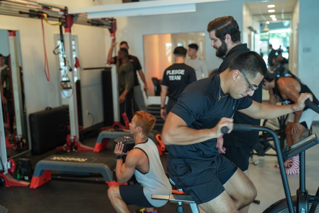 Pledge Team coaching clients in the studio, building real success stories at Pledge To Fitness®.