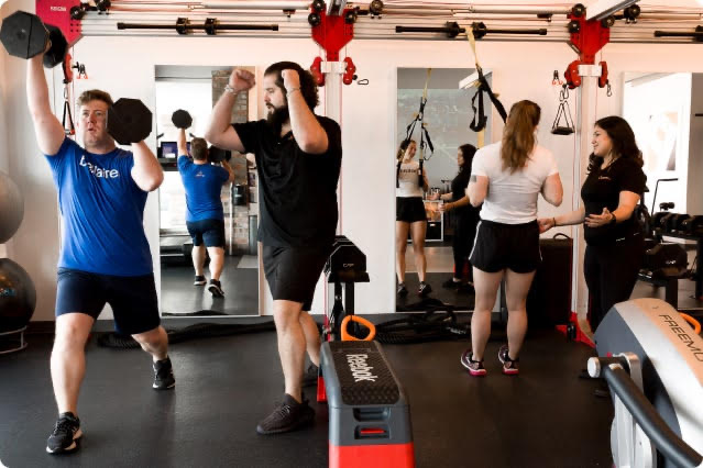 personal trainers with clients | Pledge to Fitness