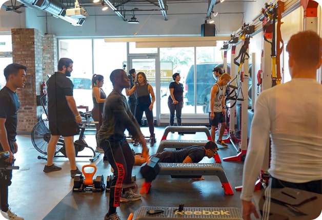 Pledge to Fitness | people working out together in a gym