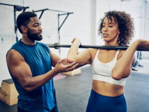 Explore the reasons to hire a personal trainer.
