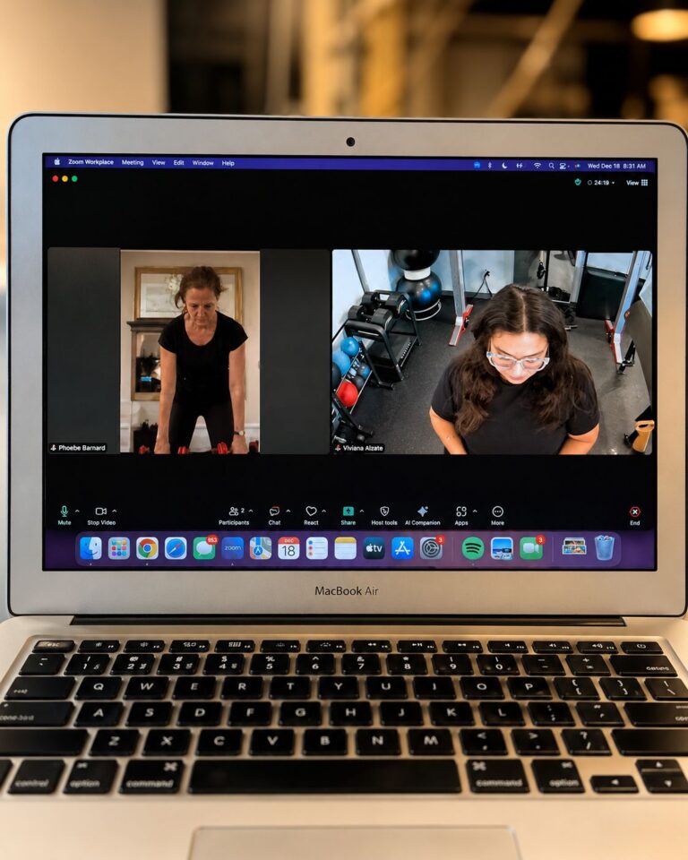 Client receiving live online personal training from a Pledge To Fitness coach during a virtual workout session.