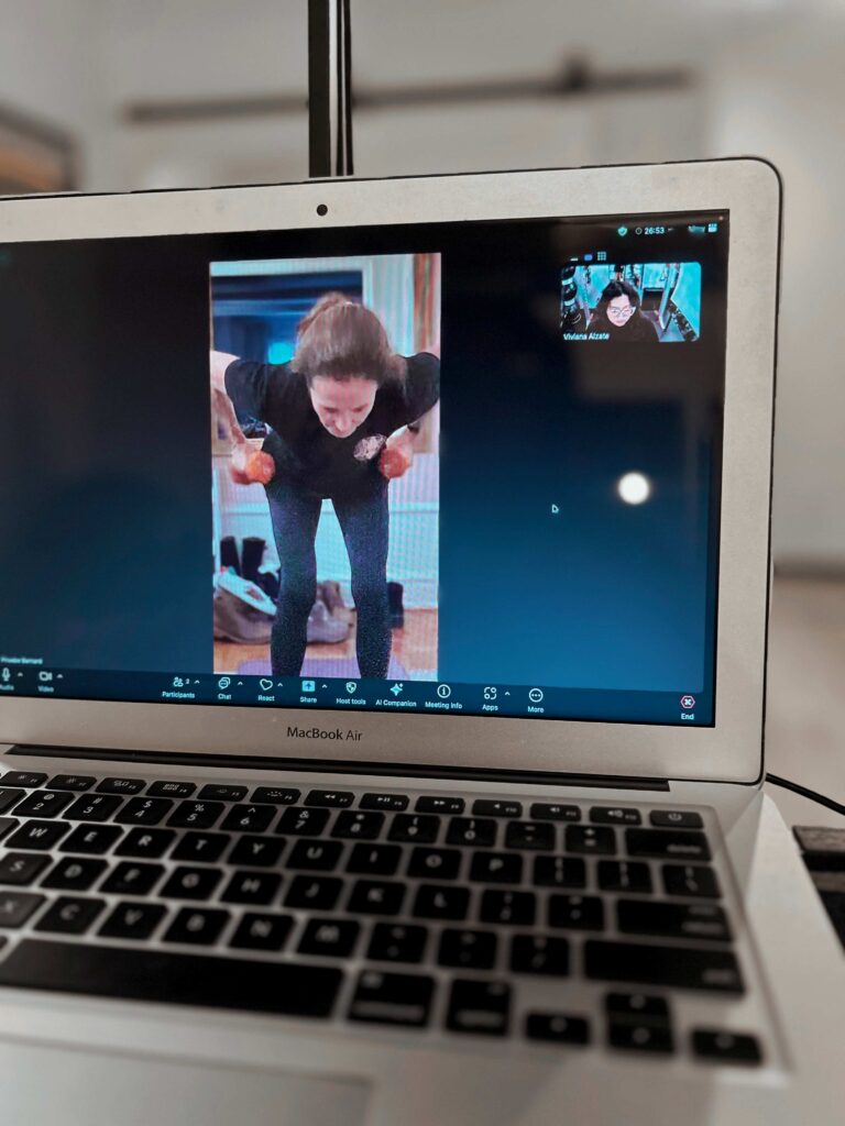 Client performing a good morning exercise during an online fitness program with Pledge To Fitness®.