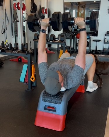 Results from a fitness for busy professionals program: Dr. Collin Conrad building strength and lean muscle through consistent training.